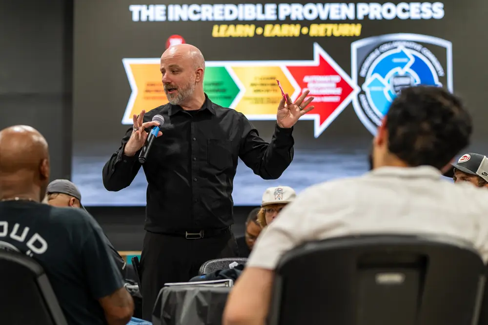 Joe Quick teaching the Incredible Proven Process to business owners at a Concrete Protector event